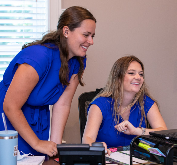 two women at a desk