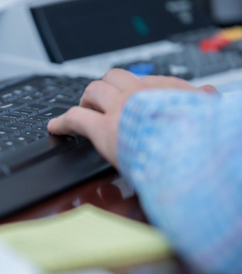 typing on a keyboard